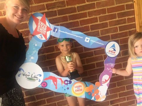 Star Swimmer with family July 2019